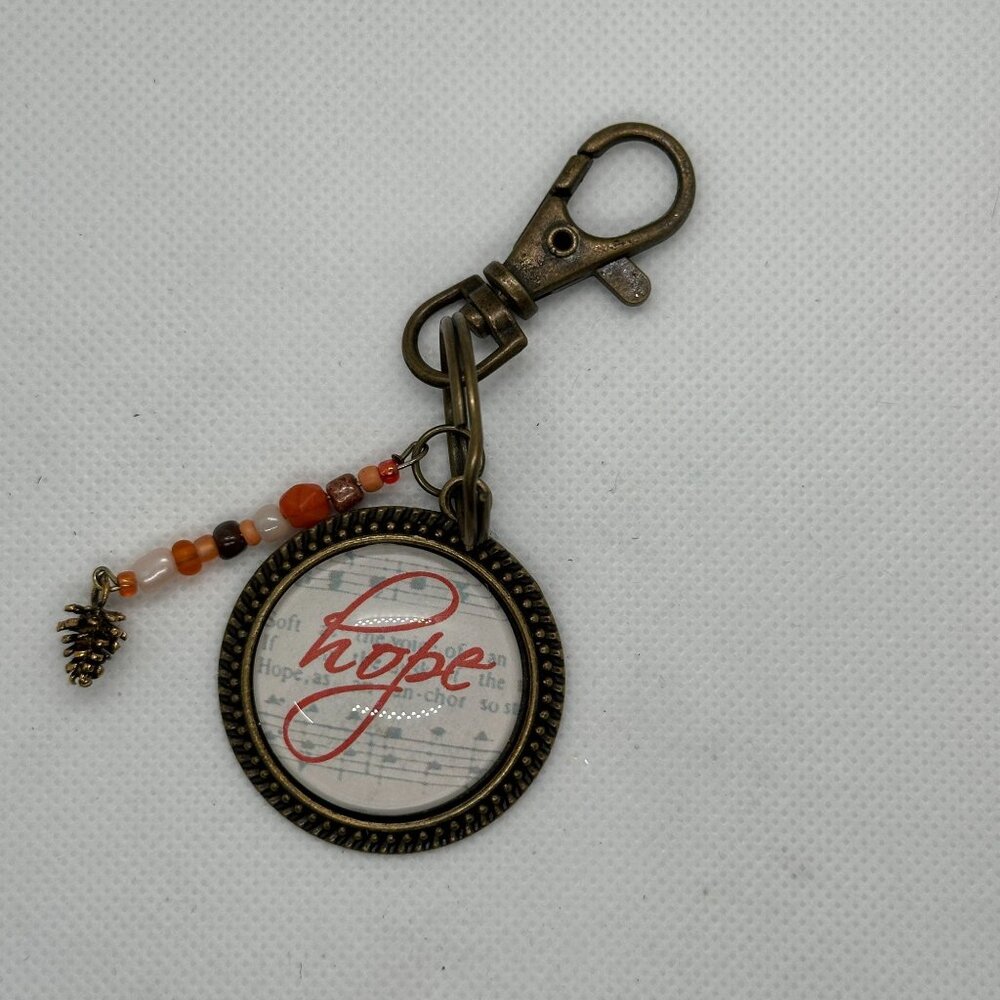 Bronze Hope Keychain With Beaded Charm & Pinecone Accent